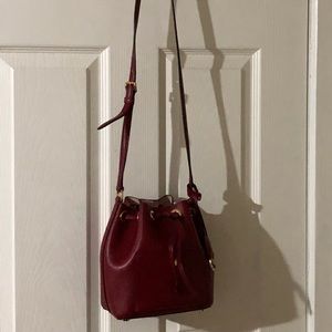 Red Michael Kors drawstring bucket purse